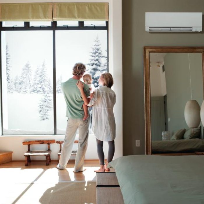 Couple and baby son looking out window.169087027
169087027